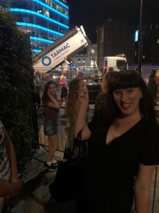 Photo of the blog author Kate Jones with a Tarmac tipper in the background.