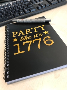 Photo of notebook with the slogan Party like it’s 1776